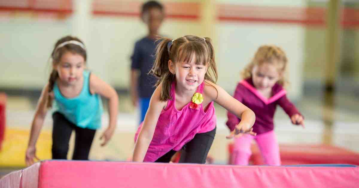 kids on gymnastics mat