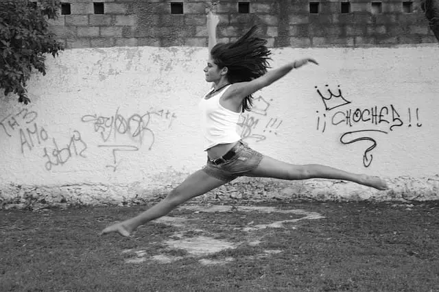 gymnast performing floor routine outdoors